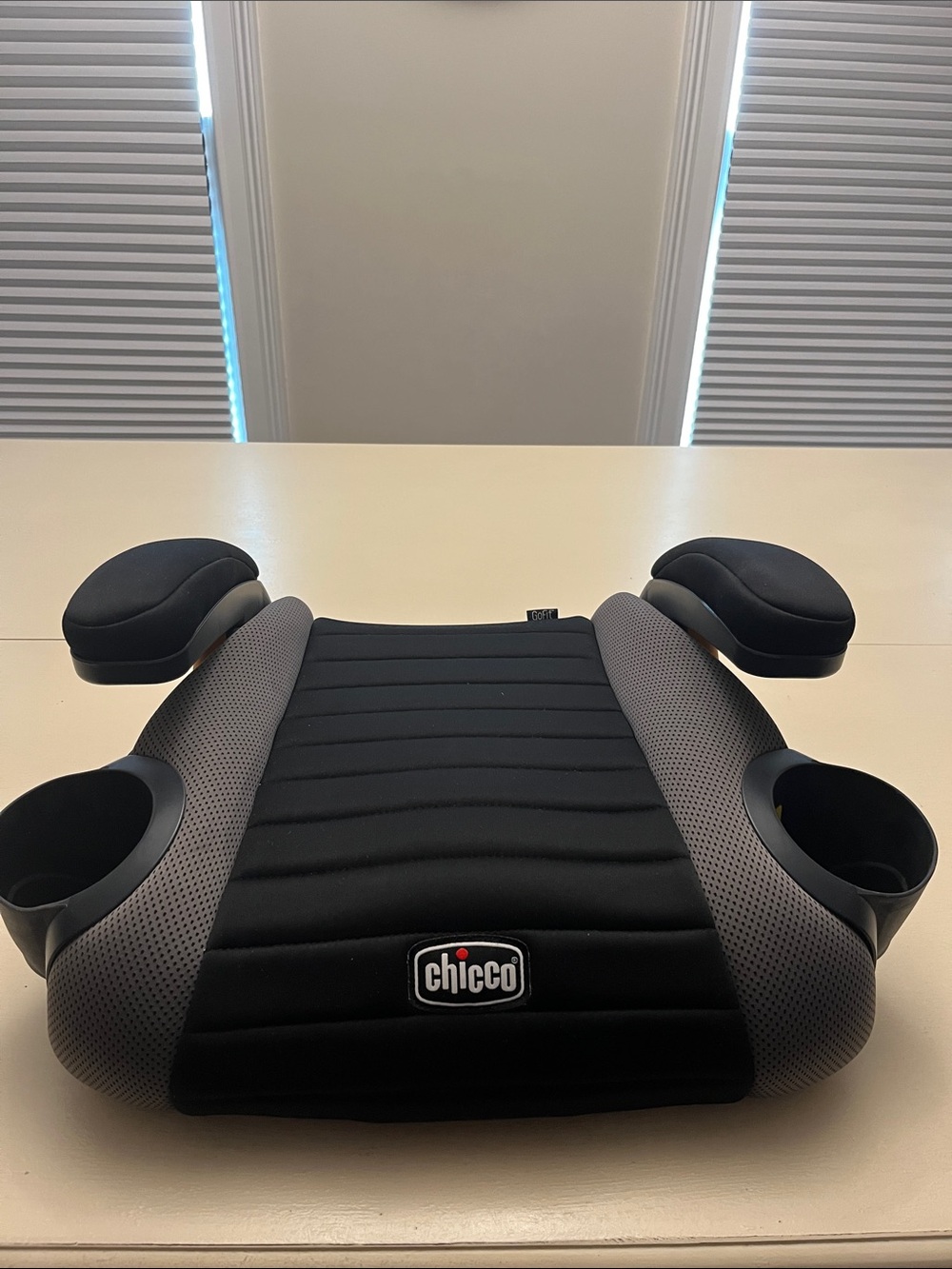 chicco Black Booster Seat with Armrests and Cup Holders